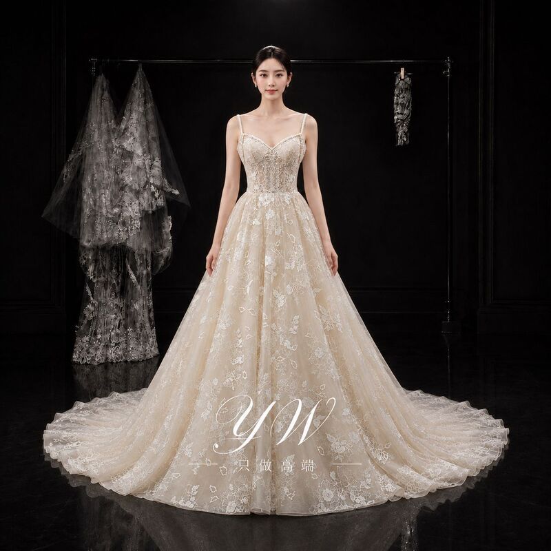 High-end champagne-colored lace wedding dress with elaborate floral embroidery and a long train skirt, romantic and slimming bridal gown High-end champagne-colored lace wedding dress with elaborate floral embroidery and a long train skirt, romantic and slimming bridal gown
