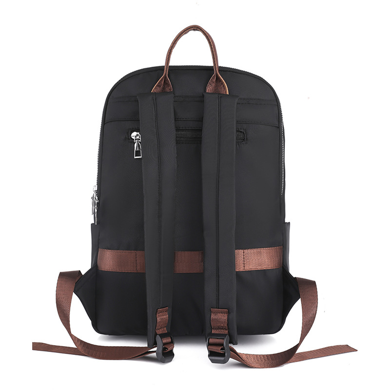 Fábrica al por mayor 2023 nueva mochila de tela Oxford para mujer retro casual de gran capacidad de 14 pulgadas para mujer