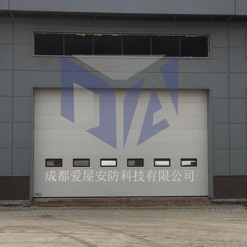 Industrial Lift Door Vertical Steel Electric Sliding Lift Door Insulation Door Factory Door Manufacturer