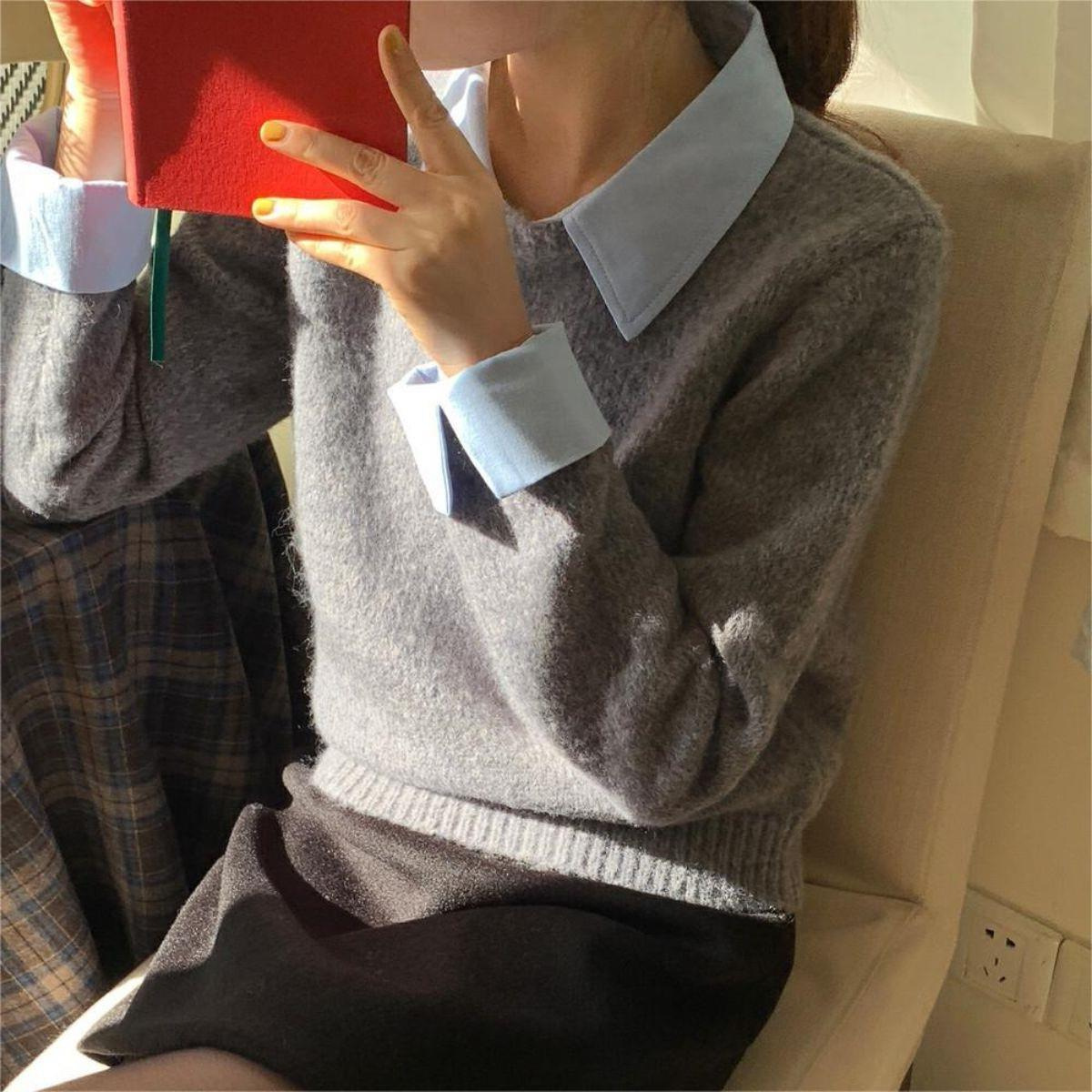 韓国系の偽のシャツの襟のセーターの女性の秋冬の新型の中で怠惰な風が色の襟のニットの上着の女性にぶつかります。