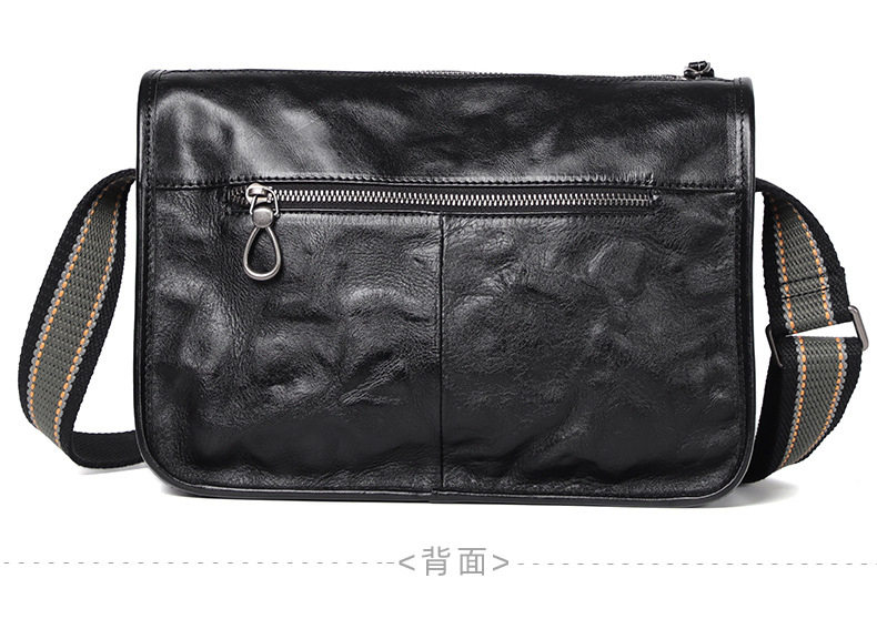 Túi đeo chéo nam da bò kiểu retro 29×11×17 cm — Màu đen da thực vật, Da cầm tay màu đen chi tiết 23