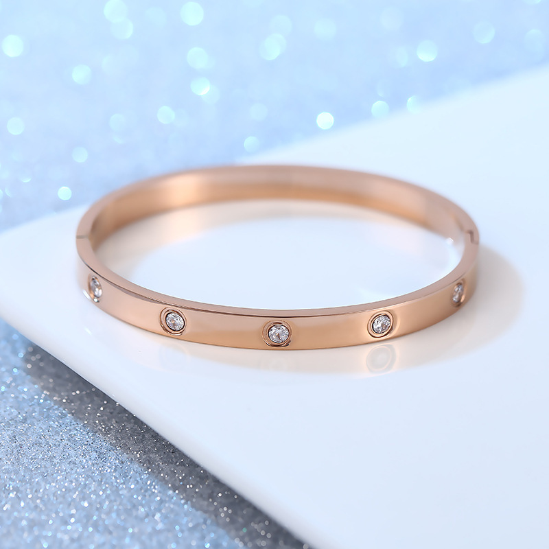 Pulsera de pareja de acero de titanio con 10 diamantes, diseño simple y elegante tipo cielo estrellado, venta al por mayor.
