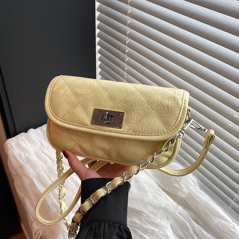 Bolso de cadena de rombos de fragancia pequeña de alta gama transfronteriza, bolso de mensajero de un solo hombro simple de moda, bolso de axila casual de todo fósforo para mujer