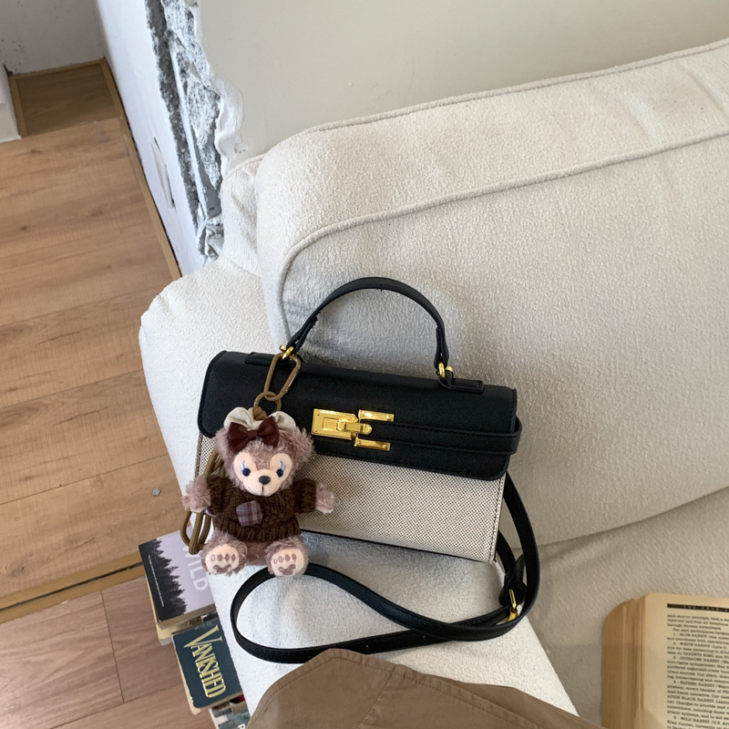 Cross-border retro bolsos europeos y estadounidenses mujeres 2026 nuevo nicho super caliente Kelly bolsa de viaje ocio mochila pequeña