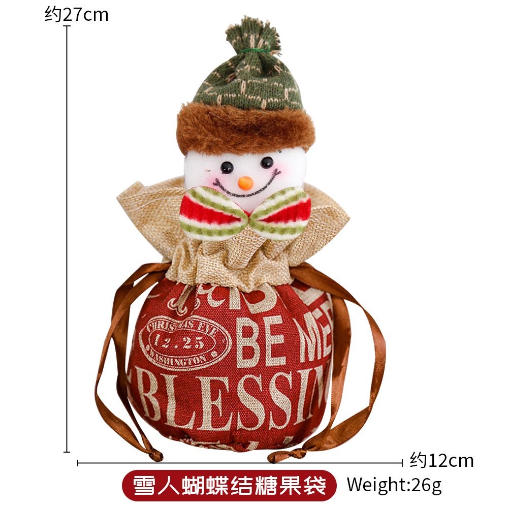 Bolsa de manzanas con arco de nieve