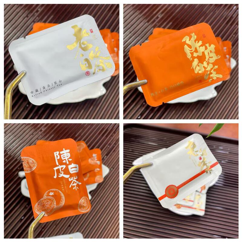 Fuding white tea tangerie white tea old white tea small square biscuit tea small bubble tea bag small round cake tea wholesale Fuding white tea tangerie white tea old white tea small square biscuit tea small bubble tea bag small round cake tea wholesale