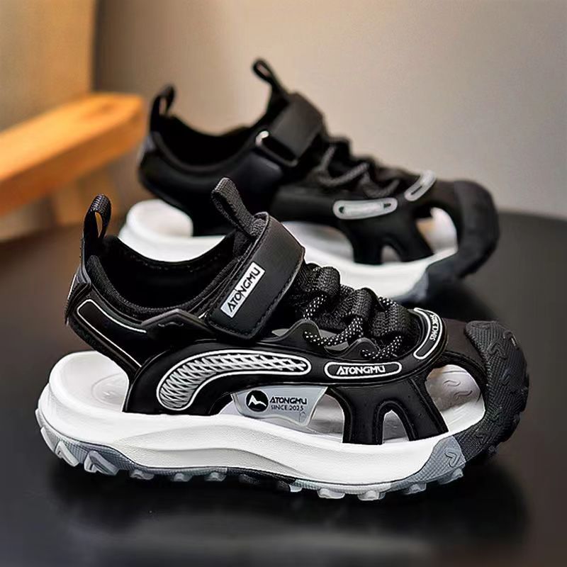 Niños sandalias Baotou 2026 verano nuevo estilo de moda para niños zapatos de playa para niños zapatillas suaves zapatillas individuales