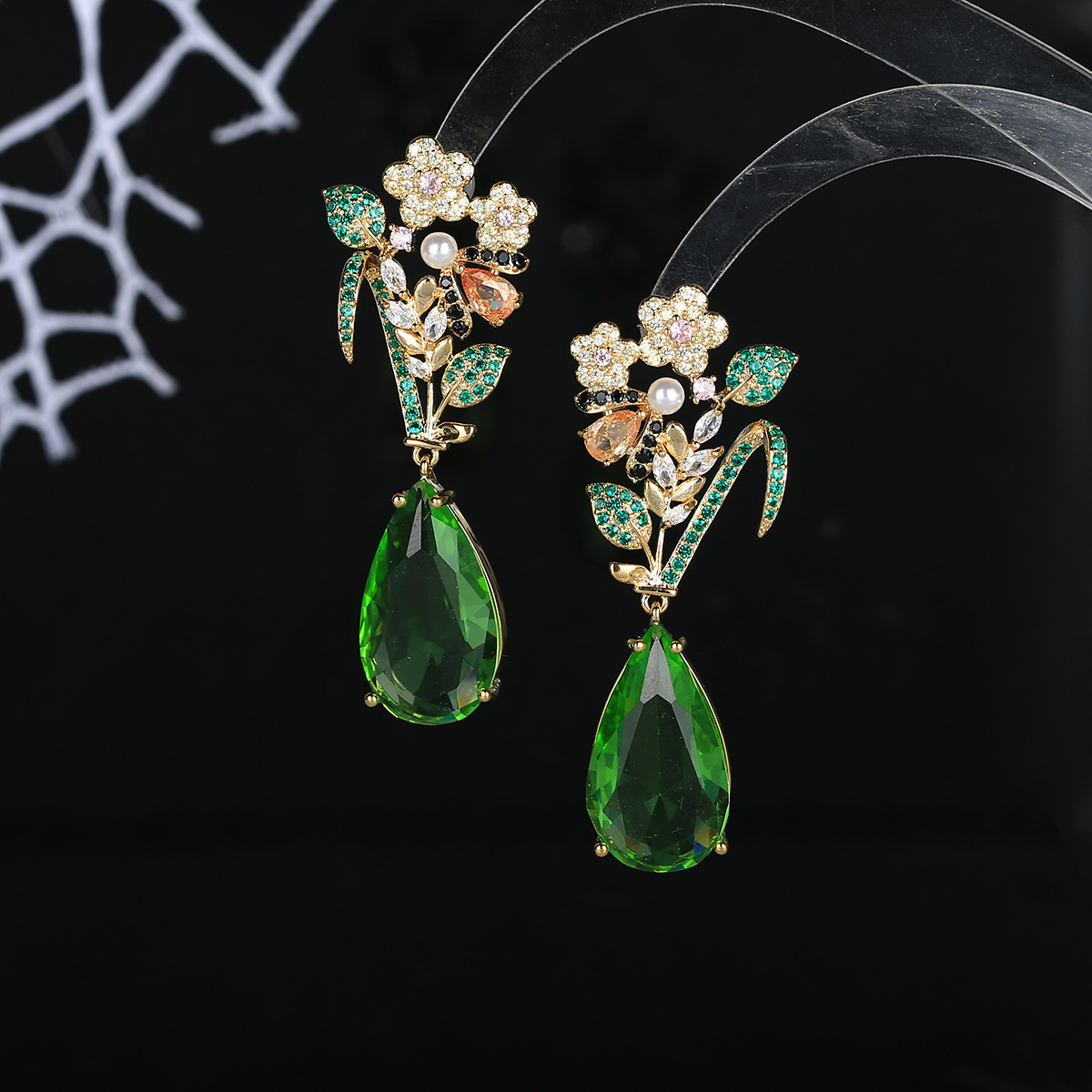 Fashionable earrings drop-shaped