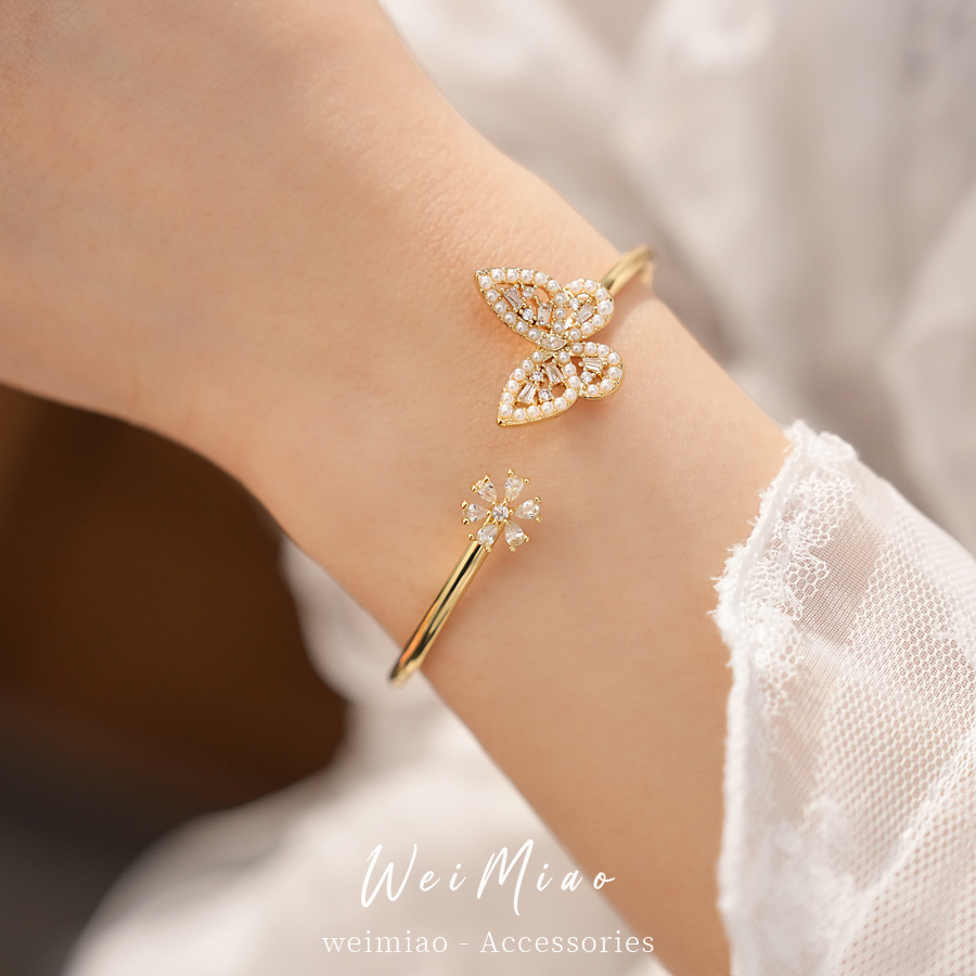 Flores de zircon mariposa abertura pulsera de perlas temperamento exquisito pulsera de moda versátil lujo ligero nicho joyería al por mayor