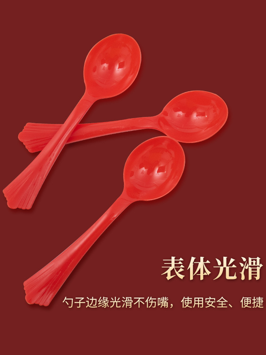 Disposable plastic red spoon