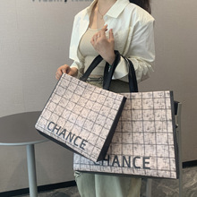 高档服装店手提袋无纺布女装衣服礼品袋塑料环保购物防水袋子定制