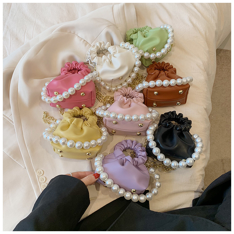255g Weight Beading, Pearls Fashion Element Clasp Frame Closure Type Top Handle, Chain Strap Type Crossbody Bag Bags Type Casual, Daily, Shopping Occasion Pu Leather Material Solid Color Pattern All Seasons Season Kid'S Gender Cute Style Bucket Shape Kid'S Pu Leather Solid Color Cute Beading Pearls Bucket Clasp Frame Crossbody Bag 1
