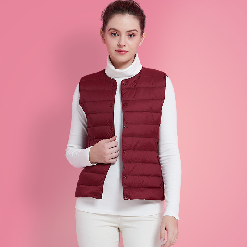 Otoño y invierno nuevo chaqueta ligera de plumón, chaleco de cuello corto de cuello redondo sin cuello ligero chaleco de color sólido