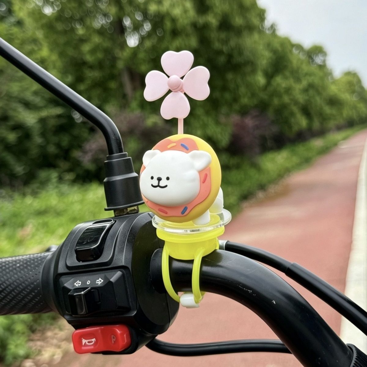 Bicycle dog figurine, windmill line dog ornament, electric vehicle decoration, cute motorcycle accessory
