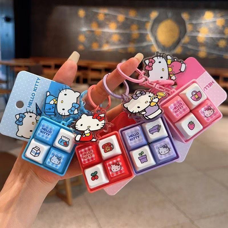 Little Red Book's Same Model as the Popular Kitty Kt Cat Hollekitty Four-Grid Sound Button Keychain for Fun Stress Relief and Venting