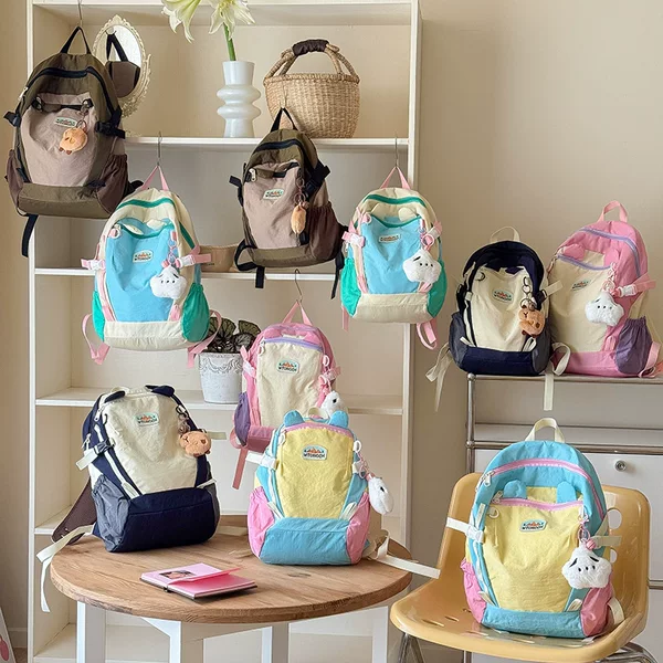 Korean-style fashion color-blocking backpack for boys and girls, lightweight and large-capacity, new model school bag for primary school students, cross-border children's backpack