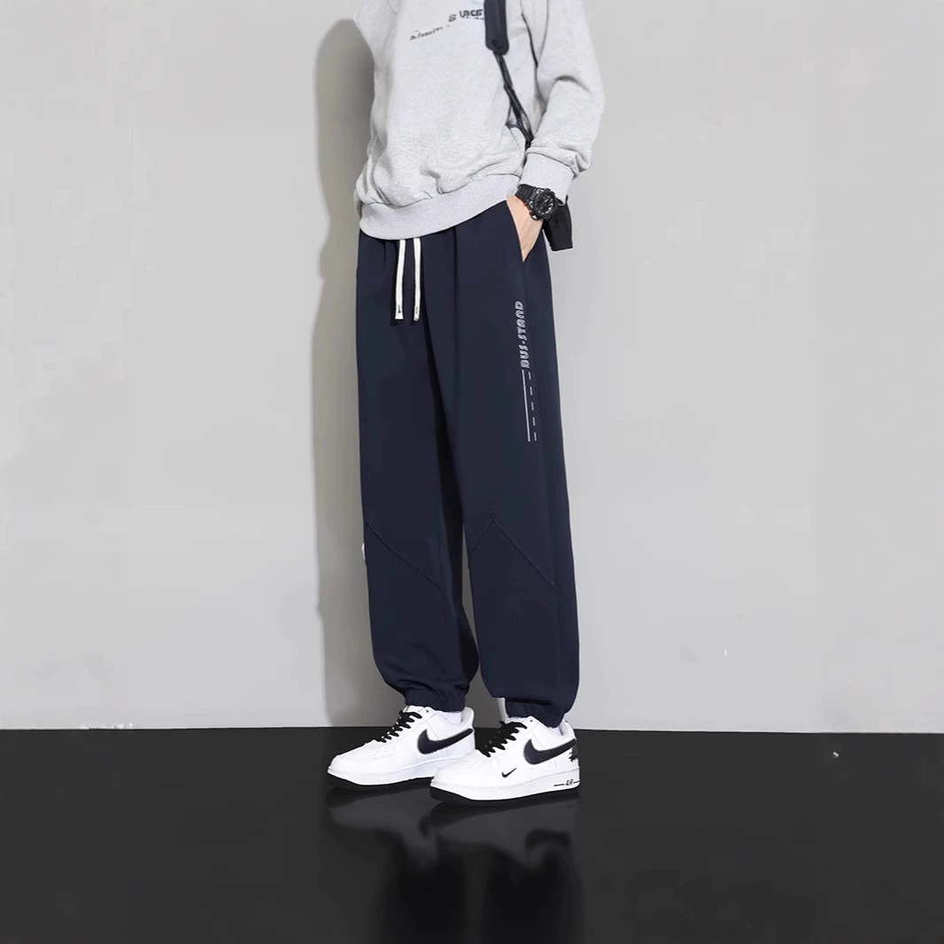 2025 новые повседневные брюки для мужчин свободная тенденция ноги Спортивные брюки толстые толстые тонкие и дикие контрольные цены 79