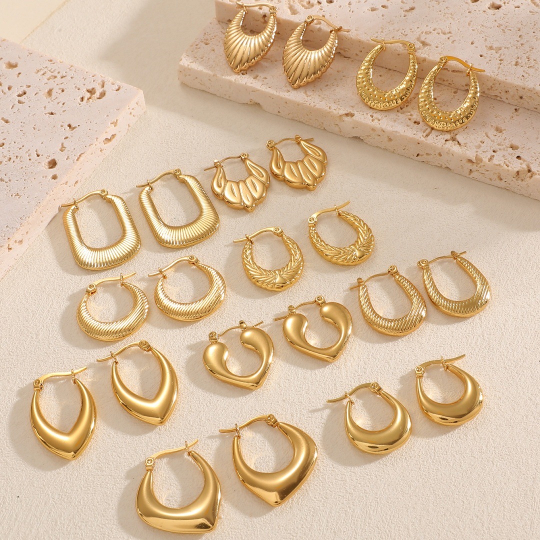 golden fashionable glossy earrings stainless steel