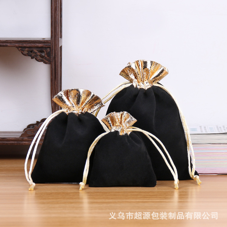 Bolso de terciopelo boca dorado Negro