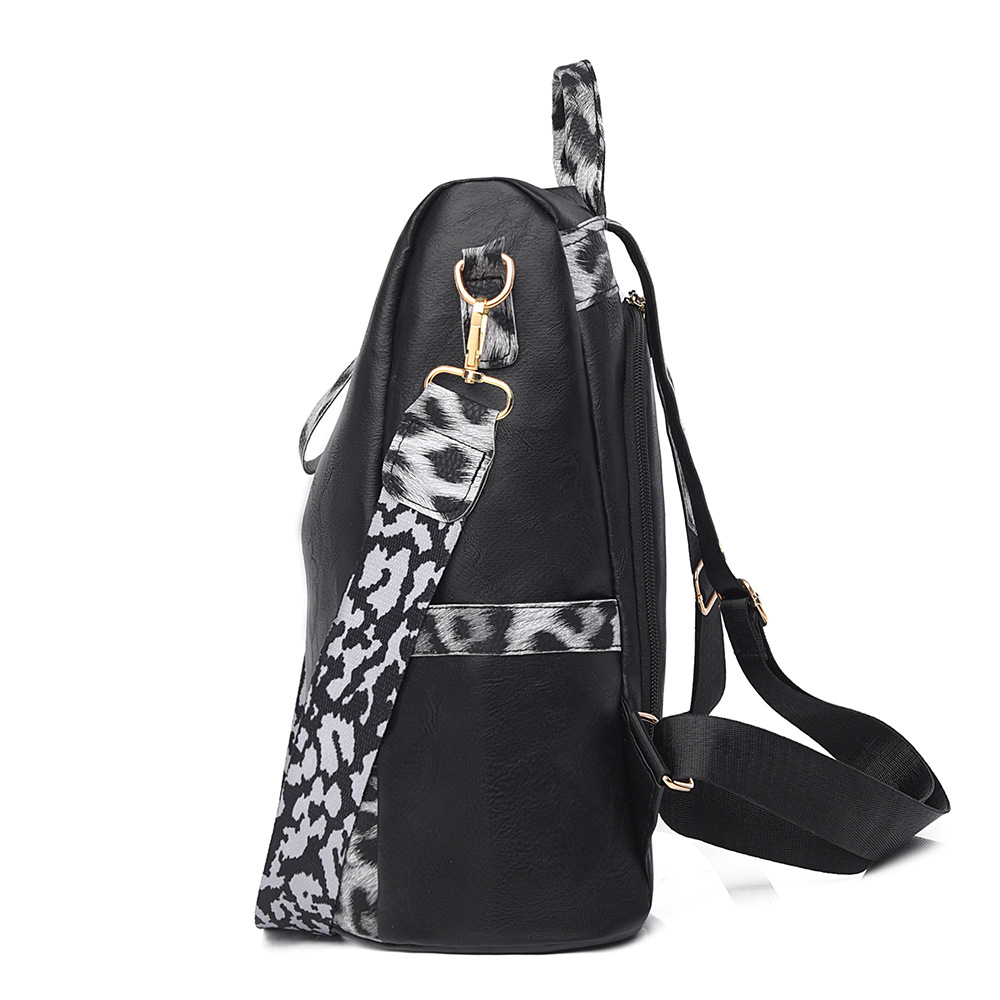 Fabricantes al por mayor 2025 nueva mochila de cuero suave para damas retro europeas y americanas moda estampado de leopardo contraste color bolso de mochila antirrobo