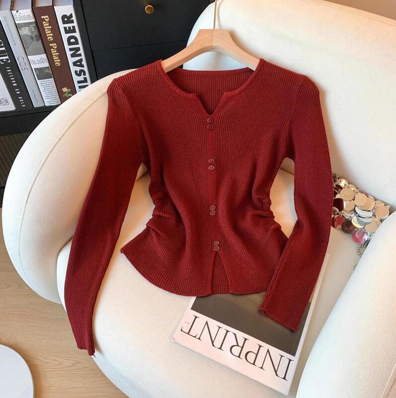 Korean-style V-neck long-sleeve knit top for women, new autumn and winter design, with slit and waist-cinching, short-length base sweater Korean-style V-neck long-sleeve knit top for women, new autumn and winter design, with slit and waist-cinching, short-length base sweater