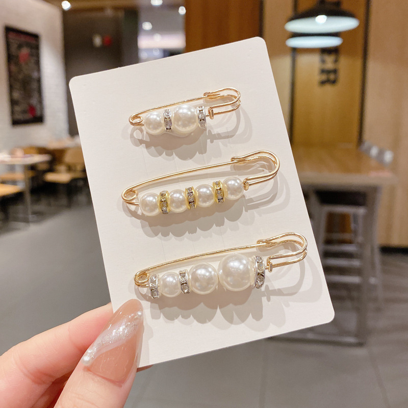 Broche de cintura para mujer falda apretada cintura artefacto pin fijo botón de botón anti-peregrino broche anti-peregrino