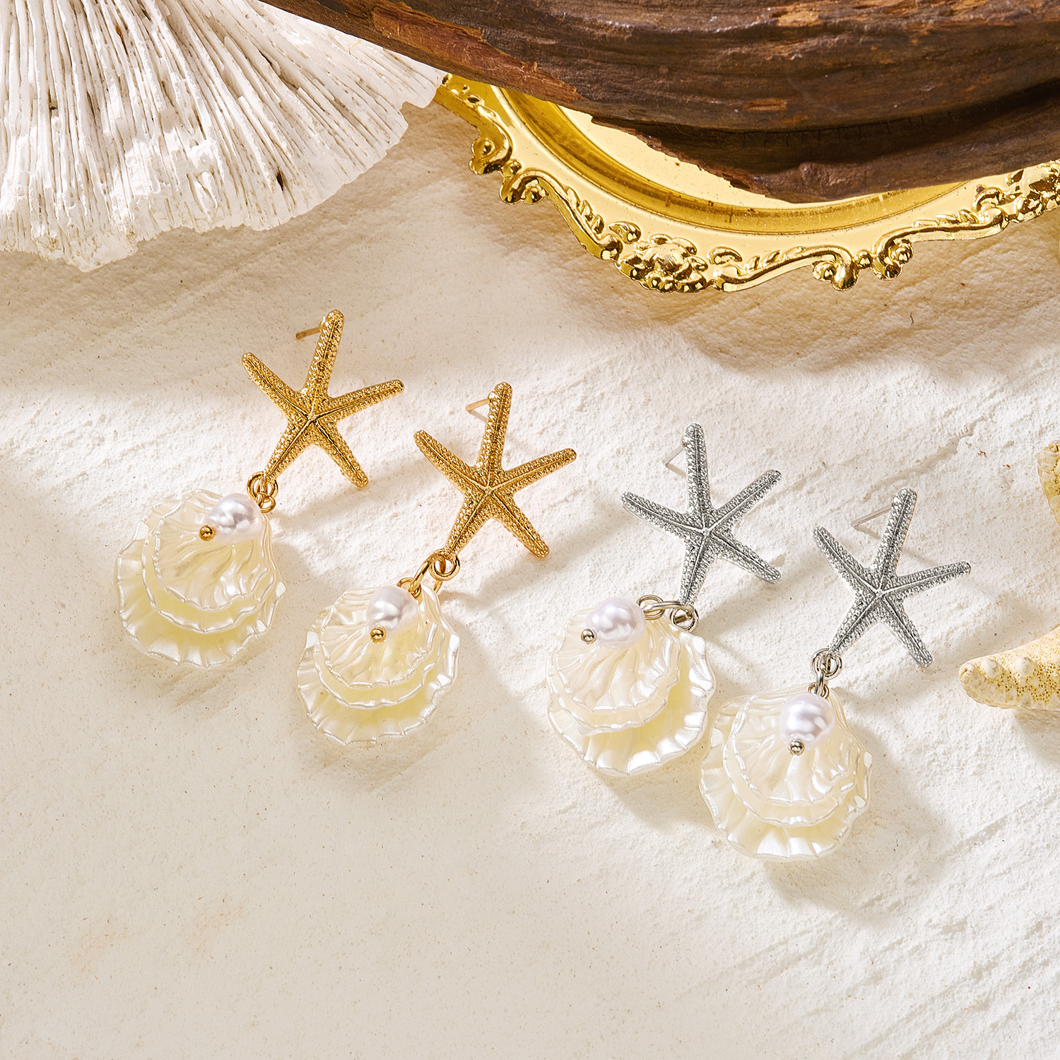 Orecchini a lobo con stella marina e perle stile resort mare_voghion.com