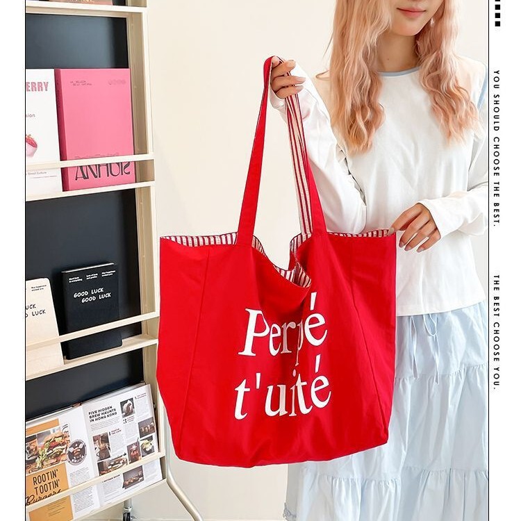 A Large Double-Sided Tote Bag with Two Sides, Versatile for Daily Commuting, Large Capacity, Color-Blocking Letter Stripe Bag for Women