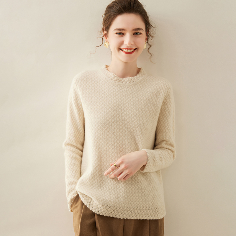 Elegant demi-season cashmere knitted design sweater with a round…