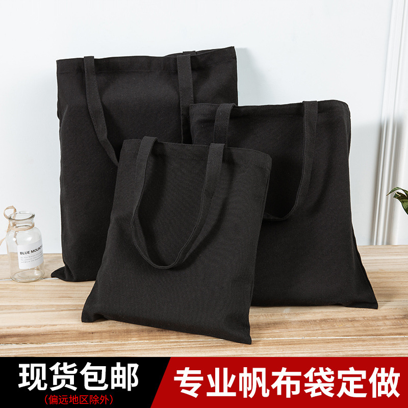 Bolsa de lona pequeña negra simple de las mujeres en stock bolsa de lona portátil en blanco Fábrica crossbody estudiante publicidad artística de un solo hombro