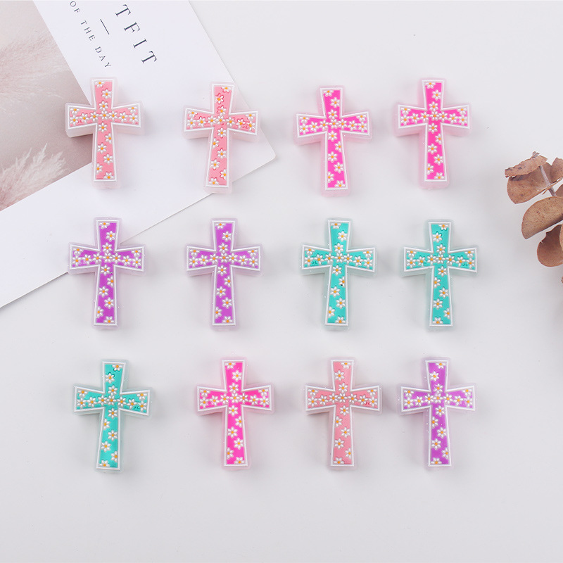 Nuevos productos para bebés Cruz de dibujos animados pequeño mordedor creativo bricolaje bebé molar chupete anti-caída de la cadena accesorios