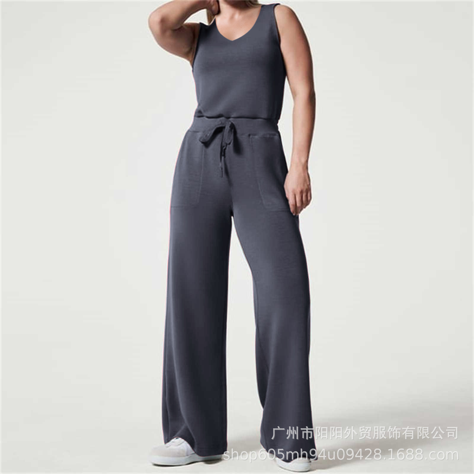 2023 primavera y verano nuevo versátil moda europea y americana adelgazamiento ocasional de las mujeres sin mangas color sólido V-cuello pantalones jumpsuit