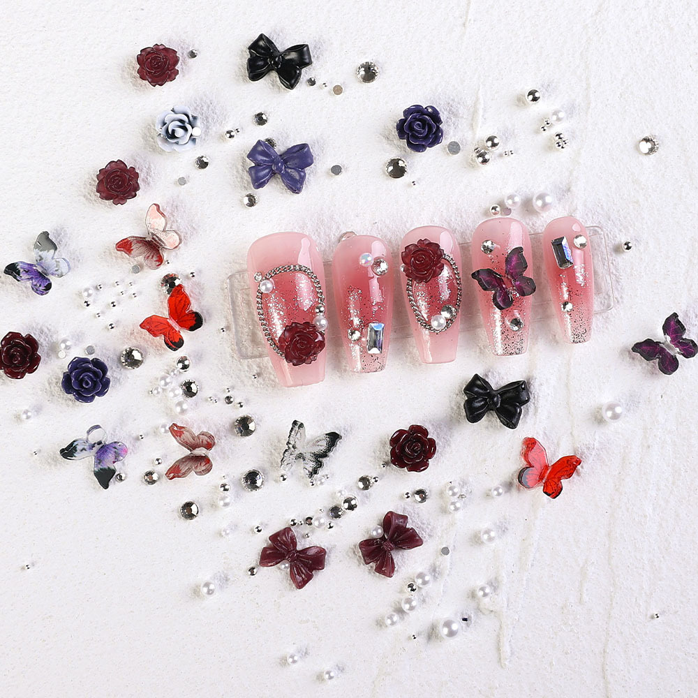 2023 nuevos accesorios de manicura camellia material paquete cadena de mariposa rosa arco mezcla combinación