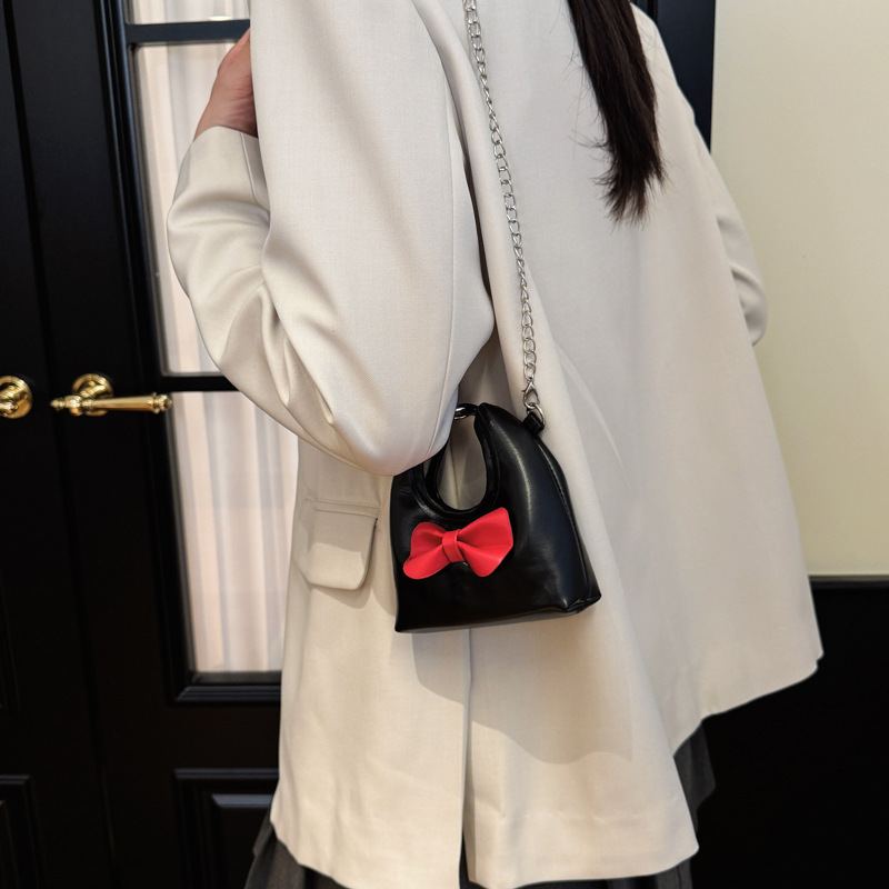 Dolce y lindo arco de hombro de niñas bolso de cadena mini pequeño bebé bolso de mano bolso de comercio exterior transfronterizo bolso de niños