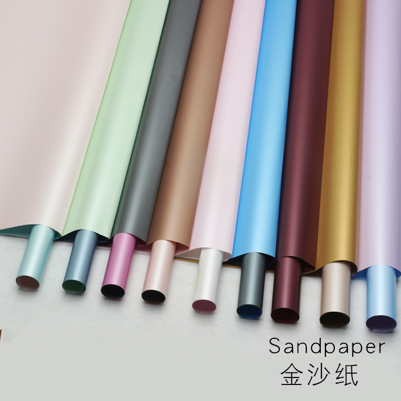 Huaxi papel de arena de oro flor papel de embalaje de papel mate de dos colores al por mayor ramo de regalo de papel de embalaje de materiales de viento fragante