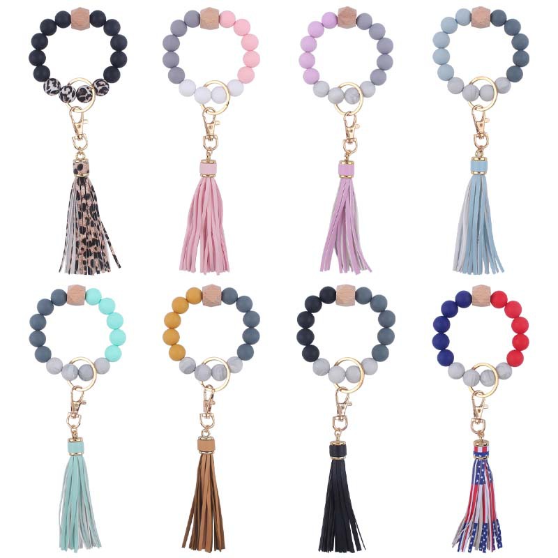 Creativo nuevo cuero pu borla colgante llavero silicona muñeca leopardo silicona pulsera llavero