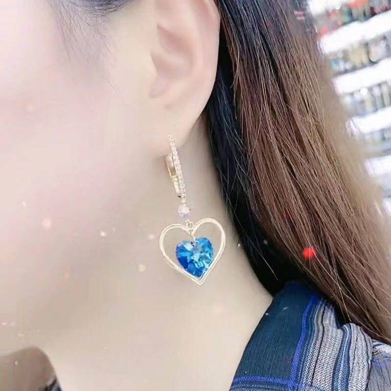 elegant fashionable earrings heart shaped