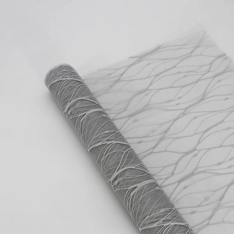 Fabricantes de fiestas de flores paquete de flores Jacquard sólido paquete de flores material de paquete de flores cortina de tela