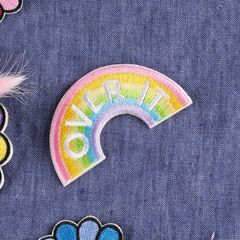 New-style computer-embroidered patch badges for notebooks, clothing accessories, and back-adhesive patches—featuring rainbow, sun, and flower designs as embroidered embellishments.