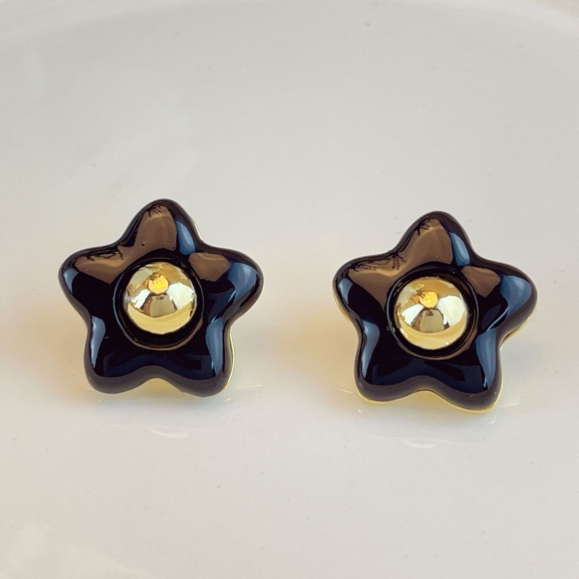 F7712 블랙 오각별 귀걸이