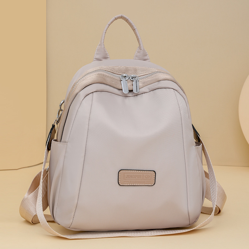 Mochila de concha simple y versátil para mujer, ligero, de alto valor, moda, pequeña mochila de tela de nailon para mujer