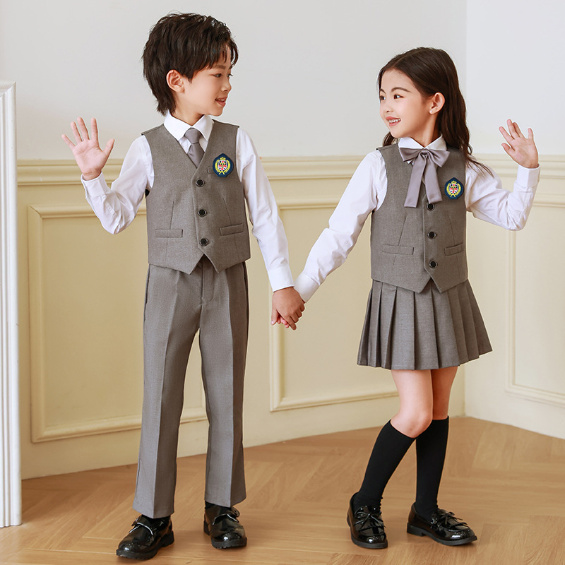 Ropa de jardín de infancia Primavera y otoño estilo británico traje vestido de primer grado ropa de cuatro piezas de escuela primaria uniforme traje