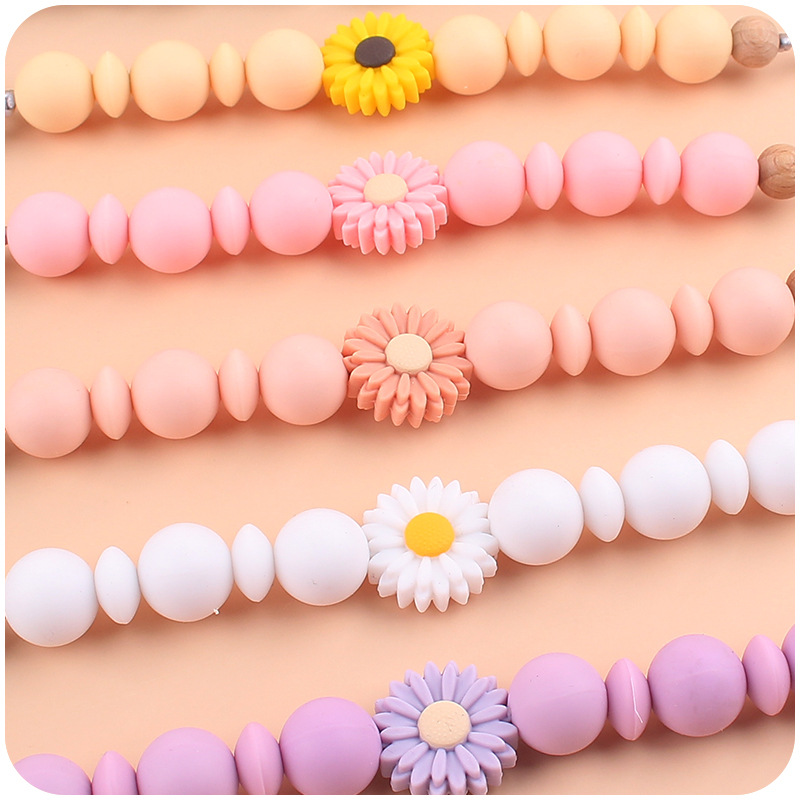 Nuevos suministros para bebés clip de chupete de haya calmante bebé dibujos animados margarita silicona anti-gota cadena chupete cadena