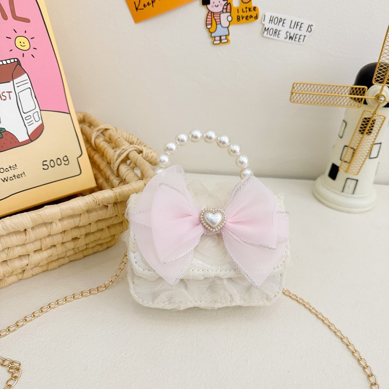 Bolsas de perlas de aire extranjero, bolsas de hombro de moda coreana, bolsas de hombro para niñas 2024 nuevas cadenas de comercio exterior bolsas para niños