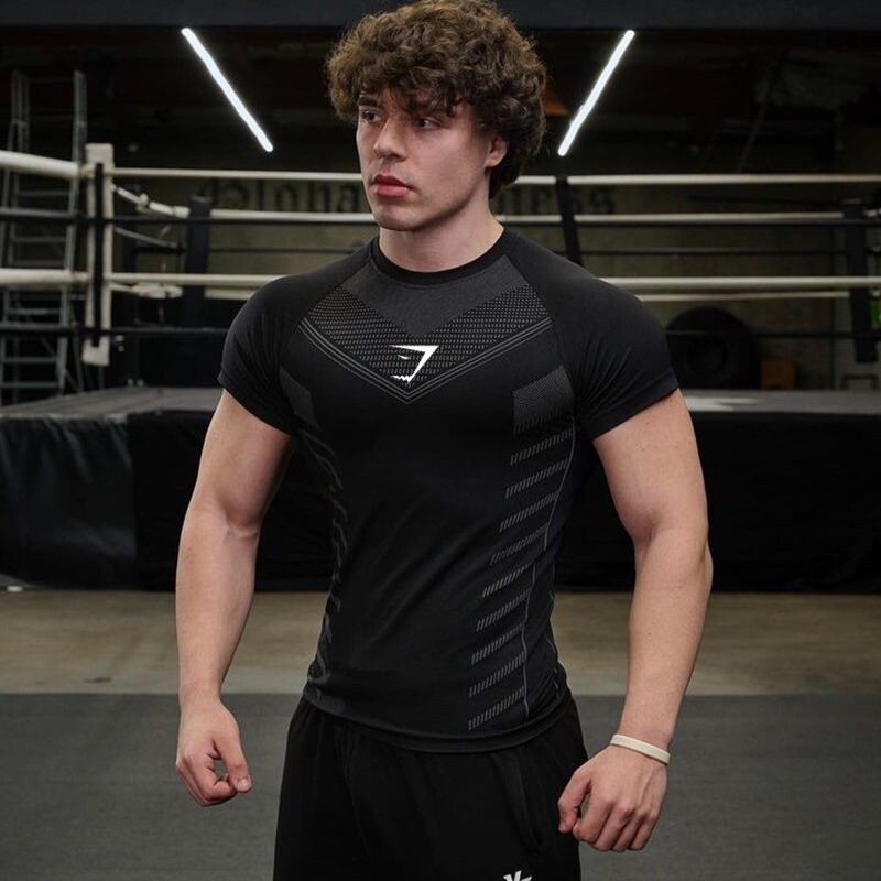 Cross-border New Muscle Fitness Clothes Coach Sports T-shirt Tight Clothes High Elastic Training Short Sleeve Fitness Clothes European Size Men