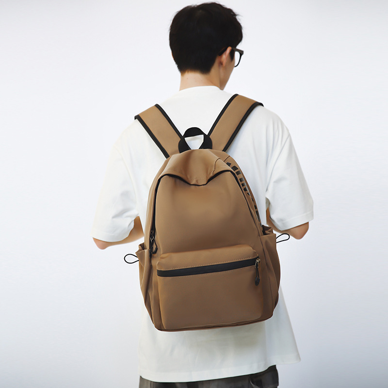 Nuevo estilo coreano en una pequeña mochila de color sólido fresco, mochila de gran capacidad, mochila de alto valor, mochila de estudiantes de moda.