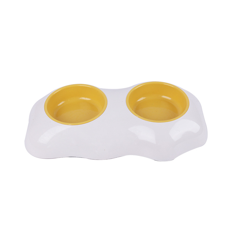 Fabricante en stock nuevo huevo amarillo solo y doble Pet Bowl doble capa antidetonante gato tazón de fuente de alimentación de agua potable cuenca perro tazón