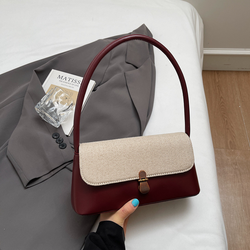 Retro nicho de viaje bolsos de brazo bolsos de mujer 2026 primavera bolsos de hombro diarios de moda bolsos de mano de alto valor