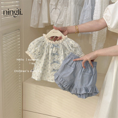 レモンの子供のレースの子供のシャツの新型の女の子の夏服の半袖の花の上着の洋風の小さいシャツの2つのセット