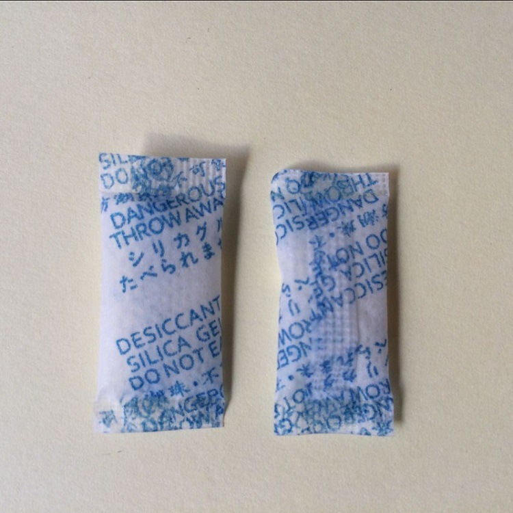 0.5克英文中文日文版透明小背封硅胶干燥剂 爱华纸多种版面可选